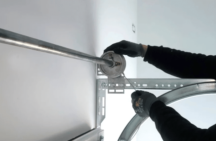 fixing a garage door cable