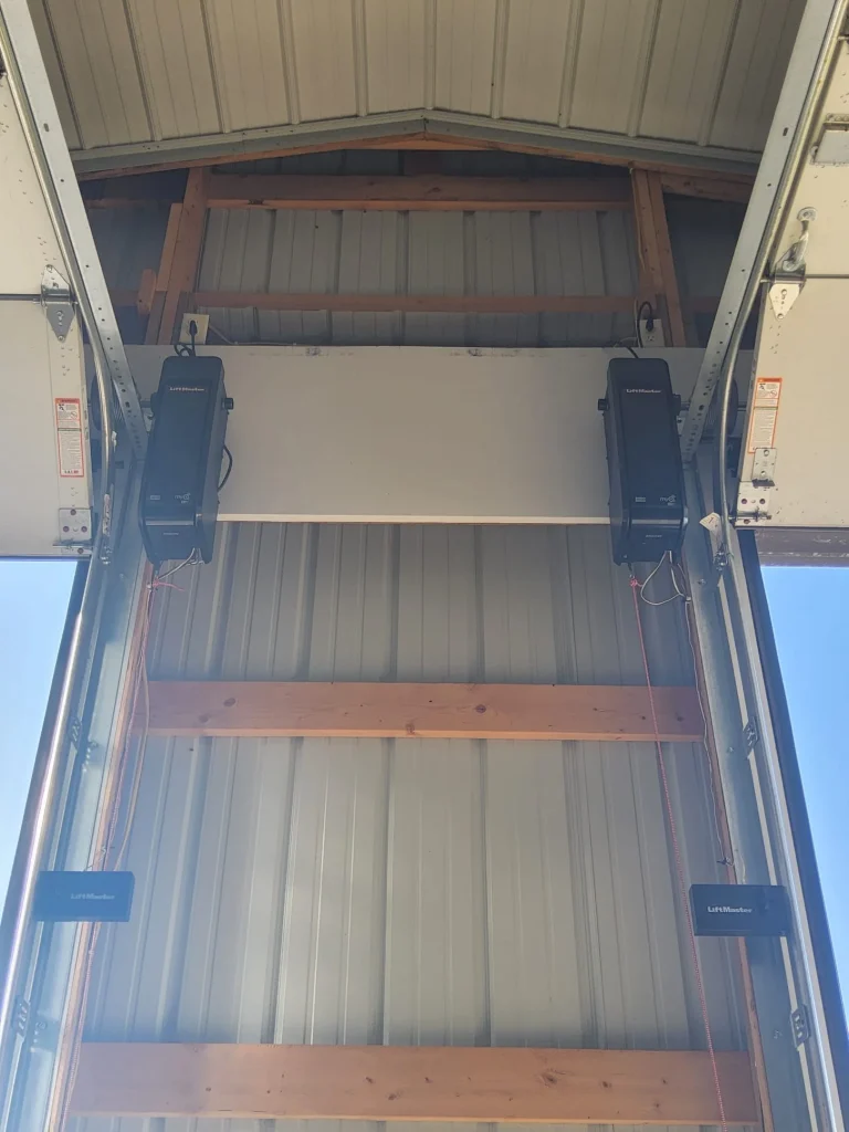 Dual wall-mounted jackshaft operators featured among the Best Heavy-Duty Commercial Garage Door Openers.